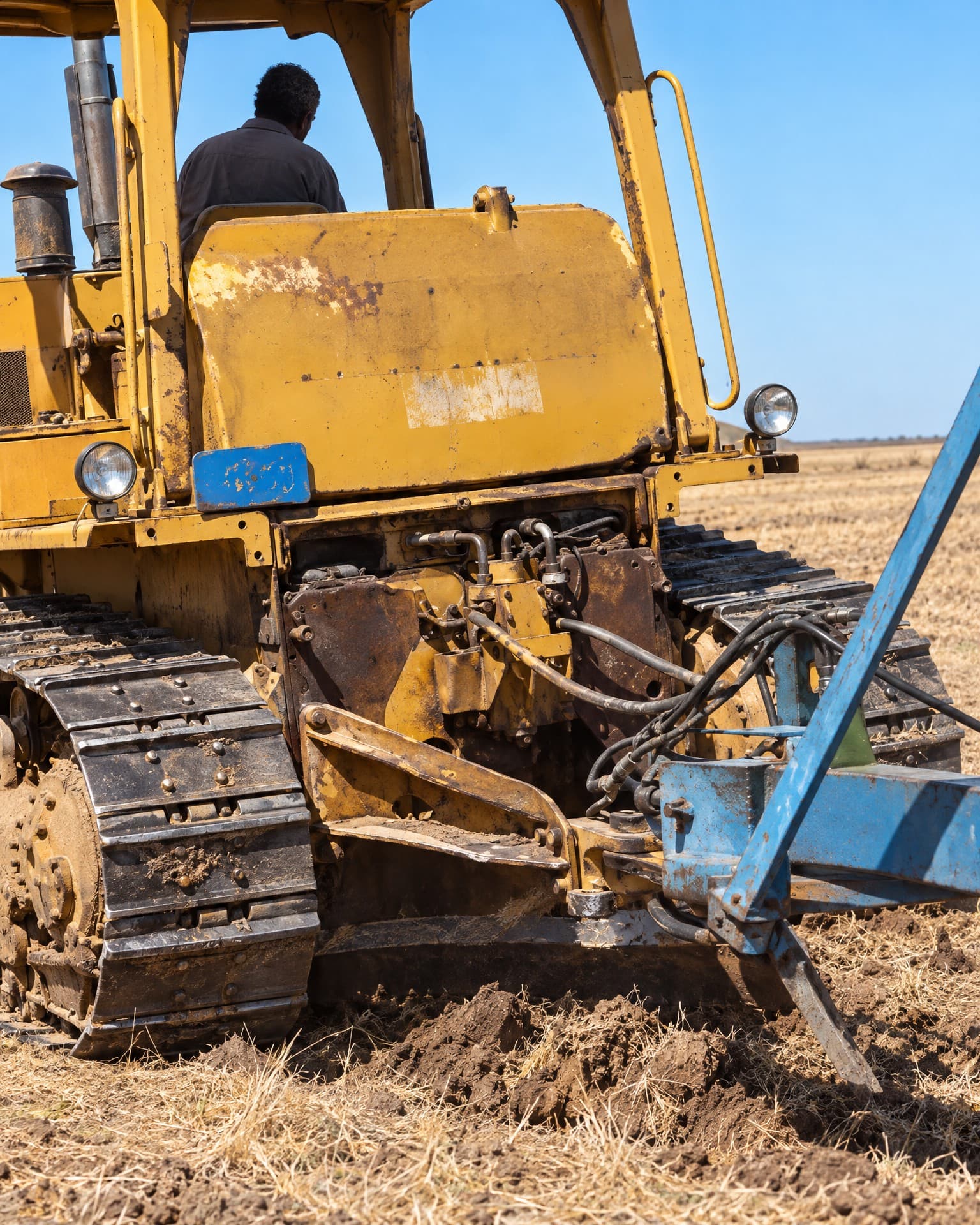 CAT bulldozer at work, seen up close.